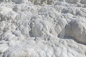 Surface of the shimmering, snow-white limestone, shaped over millennia by calcite-rich springs photo
