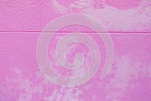 Surface of Smooth Pink cement wall texture background.