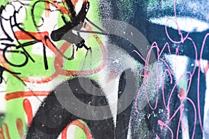 Surface of street wall with graffit - abstract colored drawings on walls of city