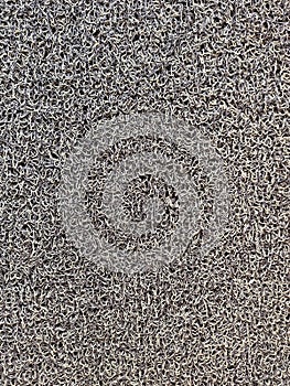 Surface texture of doormats in front of the room entrance