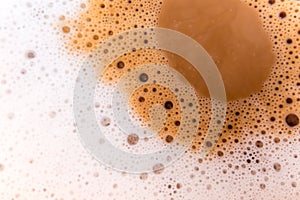 Surface texture of hot milk coffee and soft froth
