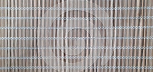 Surface of wooden mat. Asian style bamboo weave rug. Background bamboo sticks with thread uniting 1