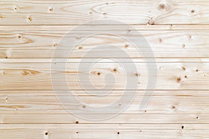 Surface wooden plank light yellow background. Flat lay view of texture, close-up wooden pattern.