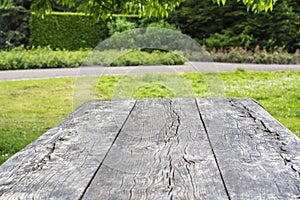 Surface of wooden table with cracks