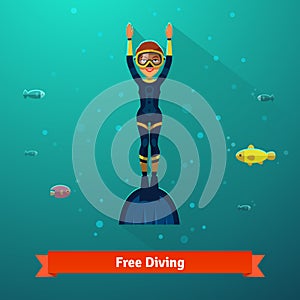 Surfacing free diver woman in wetsuit