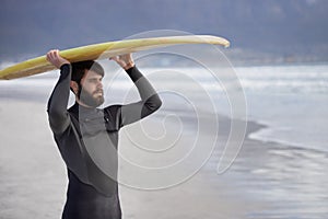 Surfboard, thinking and man on beach for surfing on vacation, holiday and weekend in ocean. Nature, waves and person in