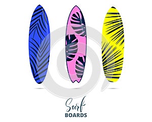 Surfboards. Colorful surfing equipment with trendy botanical tropical patterns and lettering