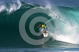 Surfer Andy Irons Surfing at Backdoor Hawaii