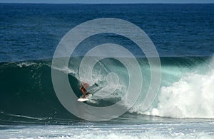 Surfer in the barrel, North Shore, Hawaii