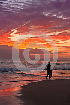 Surfer - Beach sunset - Kauai, Hawaii