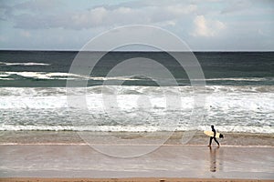 Surfer on a beach