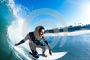 Surfer On Blue Ocean Wave