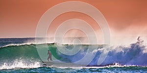 Surfer on Blue Ocean Wave in Bali