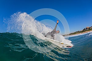 Surfer Carving Spray Wave