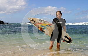 Surfer Cecilia Enriquez with Surfboard