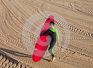 Surfer on the coast of San Sebastian or Donostia.