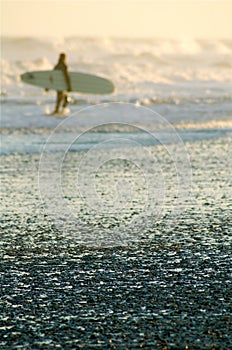 Surfer in the distance