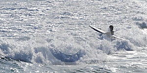 Surfer and the dramatic wave at Bondi Beach Sydney Australia