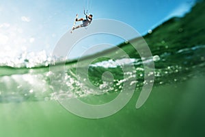 Surfer flying over the water