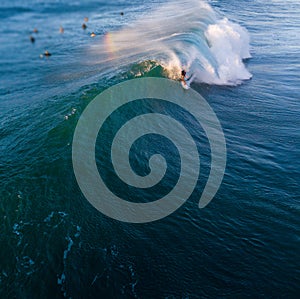 Surfer gets barreled in the wave