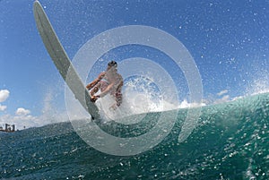 Surfer getting off a wave
