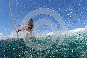 Surfer getting off a wave