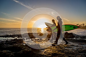 Surfer getting ready to surf on the coast of California.