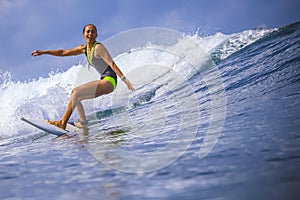 Surfer girl on Amazing Blue Wave