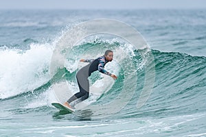 Surfer girl riding a wave