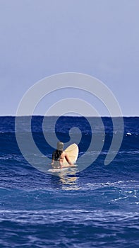 Surfer girl is waiting for a wave. Surfer school. Beautiful young woman Surfer on the wave. beautiful ocean wave. Water