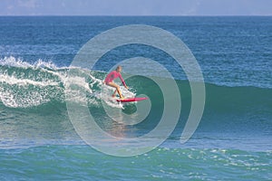 Surfer girl on the wave