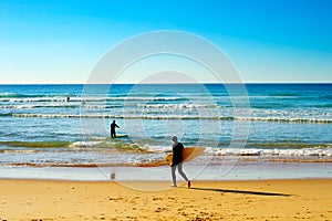 Surfer going to surf