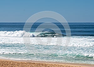 Surfer inside a tube at Banzai Pipeline beach on North Shore of Oahu