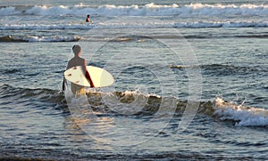 Surfer on the Kuta beach, Bali