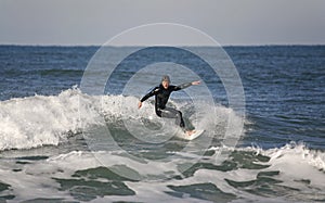 Surfer making a Forehand Cutback