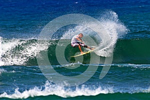 Surfer Mikey Bruneau Surfing in Honolulu, Hawaii