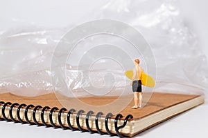 Surfer and Plastic Waste Contrast Scene