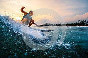 Surfer rides the ocean wave