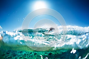 Surfer rides the ocean wave