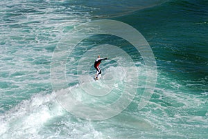 Surfer riding a wave
