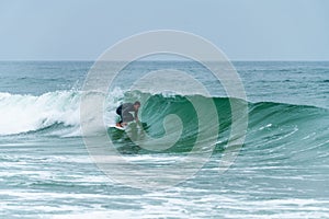 Surfer riding a wave