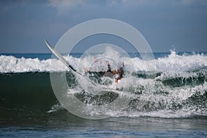 Surfer`s crash on the wave