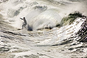 Surfer in the shorebreak