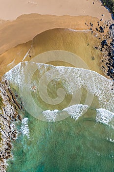 Surfer in Sonabia beach in Cantabrian sea - drone aerial 3