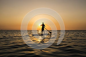 Surfer in the sunset