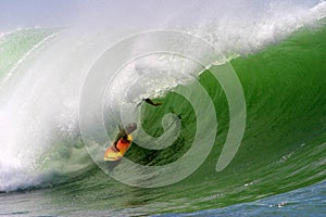 Surfer Surfing an Ocean Wave