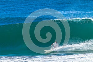 Surfer Surfing Wave Bottom Turn Action