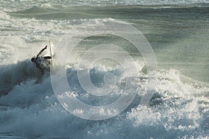 Surfer Swallowed by the Ocean, Llandudno Beach, Cape Town.