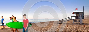 Surfer teen boys girls walking on California beach