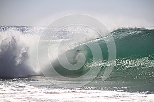 Surfer tube riding